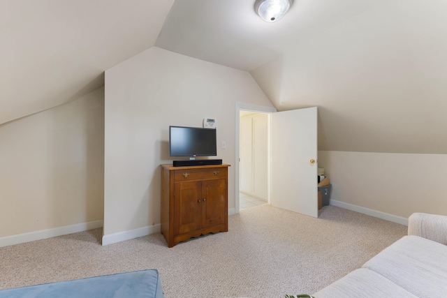 400 Chopps Cross Rd, Woolwich, ME 04579 - bedroom featuring lofted ceiling, light colored carpet, and baseboards