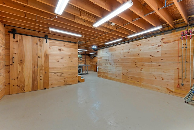 400 Chopps Cross Rd, Woolwich, ME 04579 - unfinished below grade area featuring wood walls and a barn door