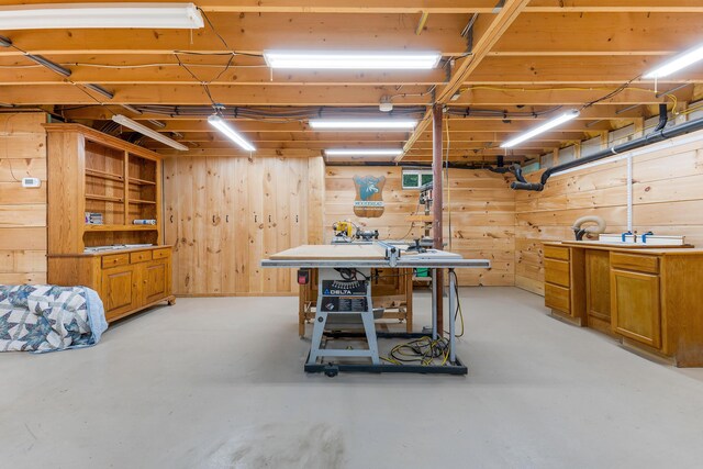 400 Chopps Cross Rd, Woolwich, ME 04579 - basement featuring wood walls and a workshop area