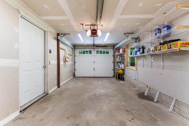400 Chopps Cross Rd, Woolwich, ME 04579 - garage featuring a garage door opener