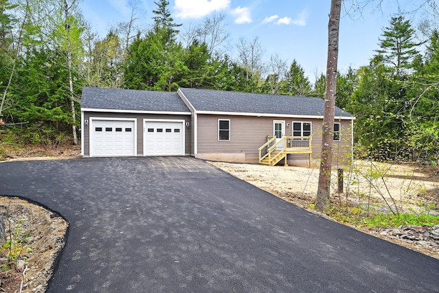457 S Reynolds Rd, Winslow, ME 04901 - view of front of house featuring driveway, an attached garage, and roof with shingles