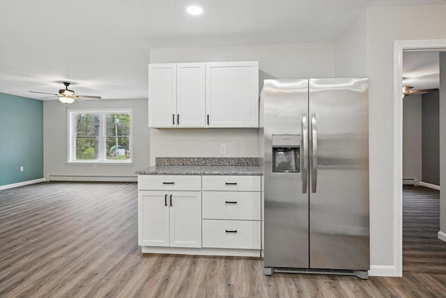 457 S Reynolds Rd, Winslow, ME 04901 - kitchen with stainless steel refrigerator with ice dispenser, a ceiling fan, baseboards, and recessed lighting