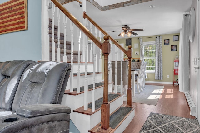 37 Birchwood Ln, Bowdoinham, ME 04008 - sitting room featuring stairway, wood finished floors, a ceiling fan, and baseboards