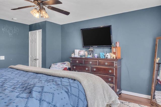 37 Birchwood Ln, Bowdoinham, ME 04008 - bedroom with wood finished floors, baseboards, and ceiling fan