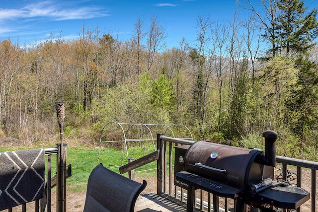 37 Birchwood Ln, Bowdoinham, ME 04008 - wooden deck featuring a view of trees