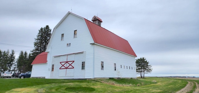 281 Cross Rd, Washburn, ME 04786 - view of barn with a lawn
