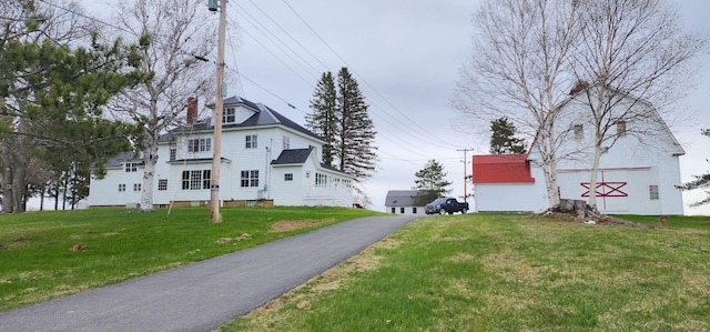 281 Cross Rd, Washburn, ME 04786 - view of side of property with a lawn and a chimney