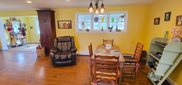 281 Cross Rd, Washburn, ME 04786 - dining room with wood finished floors, recessed lighting, a baseboard radiator, and baseboards