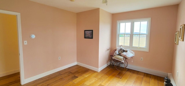 281 Cross Rd, Washburn, ME 04786 - empty room with light wood-type flooring and baseboards