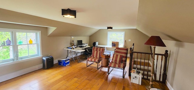 281 Cross Rd, Washburn, ME 04786 - office space featuring baseboards, light wood finished floors, and lofted ceiling