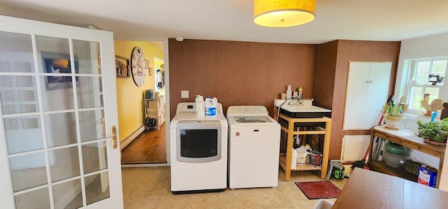 281 Cross Rd, Washburn, ME 04786 - washroom featuring a baseboard heating unit, independent washer and dryer, and french doors