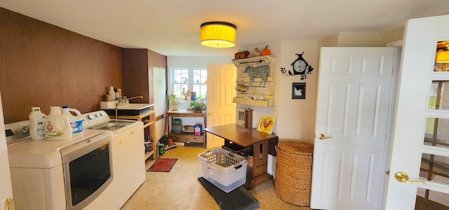 281 Cross Rd, Washburn, ME 04786 - washroom with washing machine and clothes dryer and light tile patterned flooring