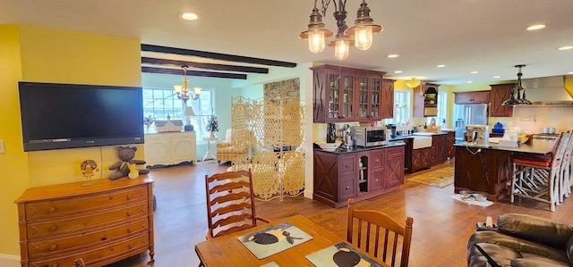 281 Cross Rd, Washburn, ME 04786 - living area featuring a chandelier, wood finished floors, recessed lighting, and beamed ceiling