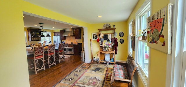 281 Cross Rd, Washburn, ME 04786 - hall featuring healthy amount of natural light, dark wood-style floors, and recessed lighting