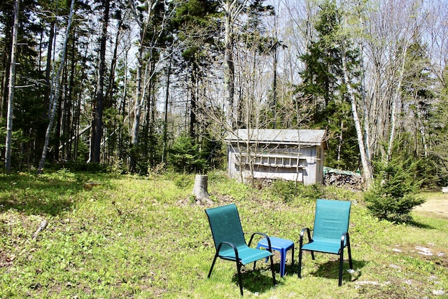 165 Mcfarland Shore Rd, Bristol, ME 04554 - view of yard with a forest view