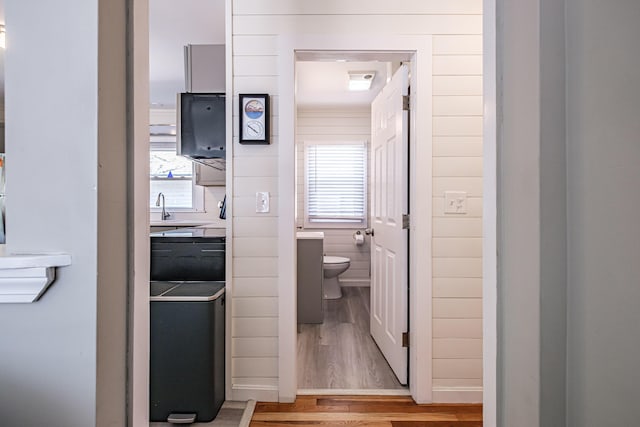 301 Sherwood St, Portland, ME 04103 - bathroom featuring toilet, wood finished floors, and vanity