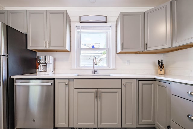 301 Sherwood St, Portland, ME 04103 - kitchen featuring stainless steel dishwasher, gray cabinets, and a sink