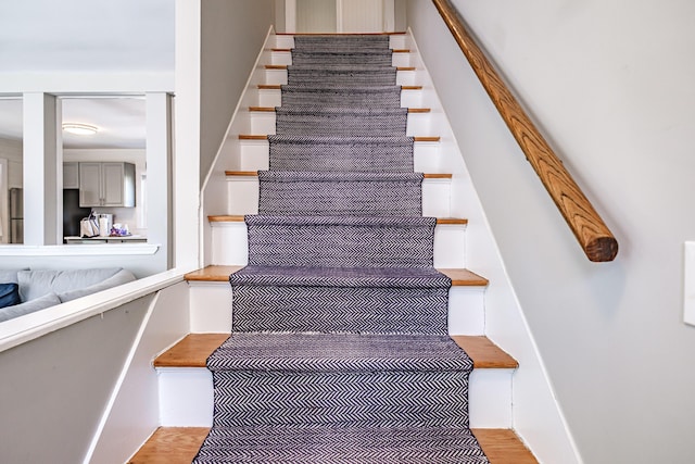 301 Sherwood St, Portland, ME 04103 - stairs featuring wood finished floors