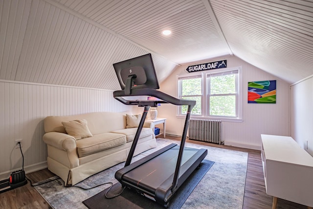 301 Sherwood St, Portland, ME 04103 - exercise area featuring radiator heating unit, wood finished floors, vaulted ceiling, and baseboards
