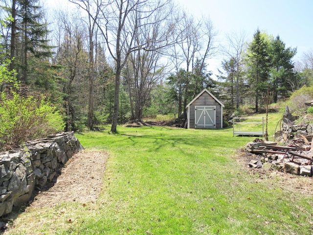 204 Clark Island Rd, Saint George, ME 04859 - view of grassy yard with a storage unit and an outdoor structure