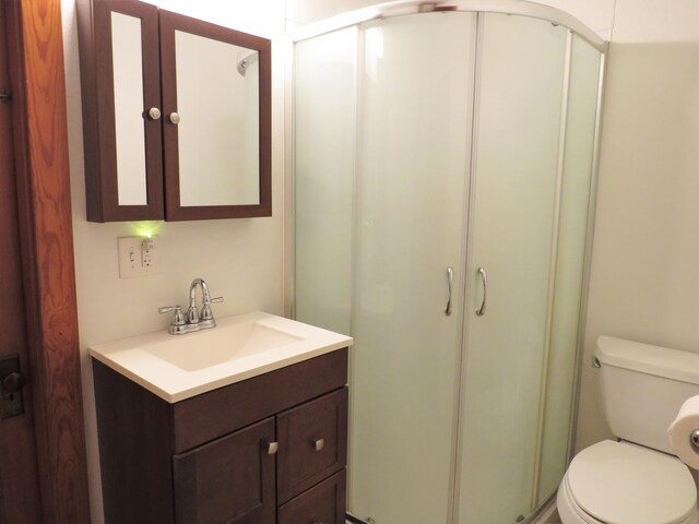 204 Clark Island Rd, Saint George, ME 04859 - full bathroom with a shower stall, toilet, and vanity