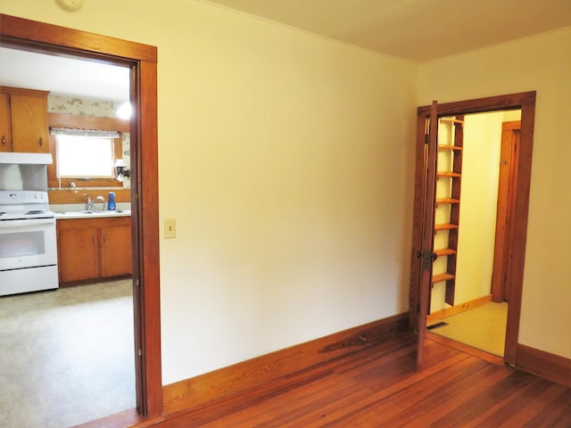 204 Clark Island Rd, Saint George, ME 04859 - spare room with light wood-style flooring, a sink, and baseboards