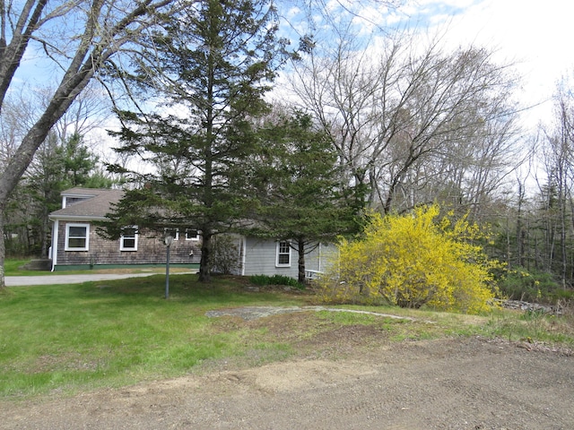 204 Clark Island Rd, Saint George, ME 04859 - view of property hidden behind natural elements with a front lawn