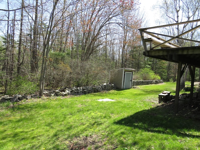 204 Clark Island Rd, Saint George, ME 04859 - view of green lawn with a storage unit and an outdoor structure