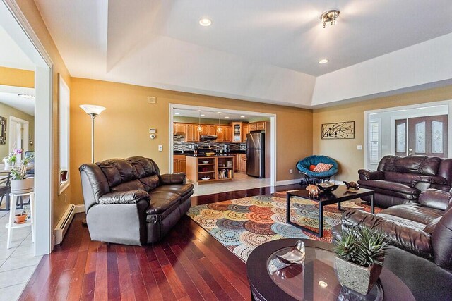 30 Royale Dr, Sidney, ME 04330 - living room with a baseboard heating unit, wood-type flooring, baseboards, and recessed lighting