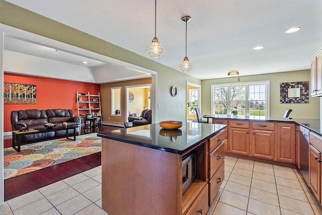 30 Royale Dr, Sidney, ME 04330 - kitchen featuring dark countertops, light tile patterned floors, open floor plan, pendant lighting, and recessed lighting