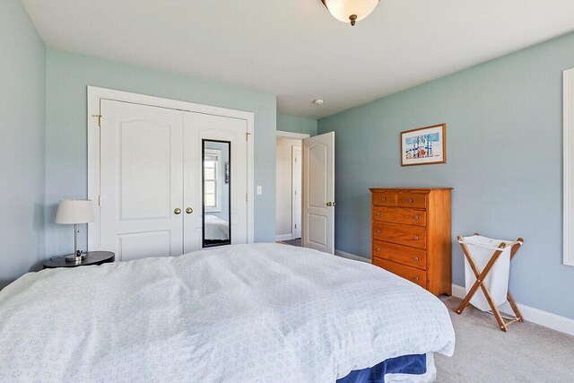 30 Royale Dr, Sidney, ME 04330 - carpeted bedroom with a closet and baseboards
