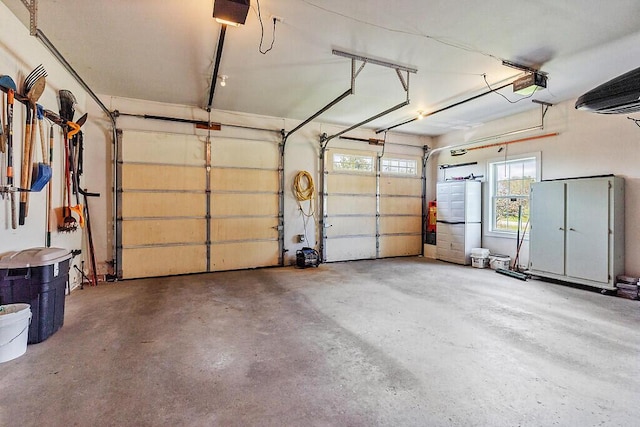30 Royale Dr, Sidney, ME 04330 - garage with a garage door opener