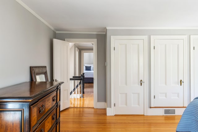 11 Summer St, Kennebunk, ME 04043 - bedroom with light wood-type flooring and ornamental molding