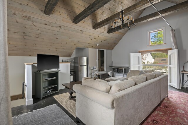 11 Summer St, Kennebunk, ME 04043 - living area with wooden ceiling, beamed ceiling, a chandelier, and high vaulted ceiling