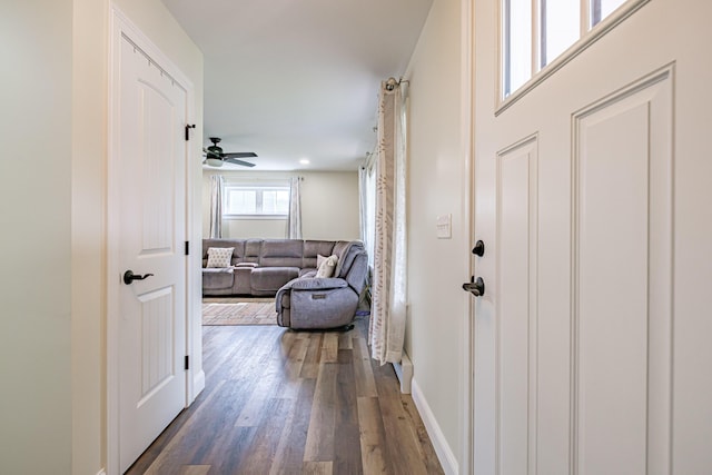 14 Bluebird Trl Unit 67, Falmouth, ME 04105 - hallway with dark wood-style flooring and baseboards