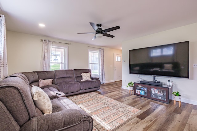 14 Bluebird Trl Unit 67, Falmouth, ME 04105 - living area featuring baseboards, wood finished floors, and a ceiling fan