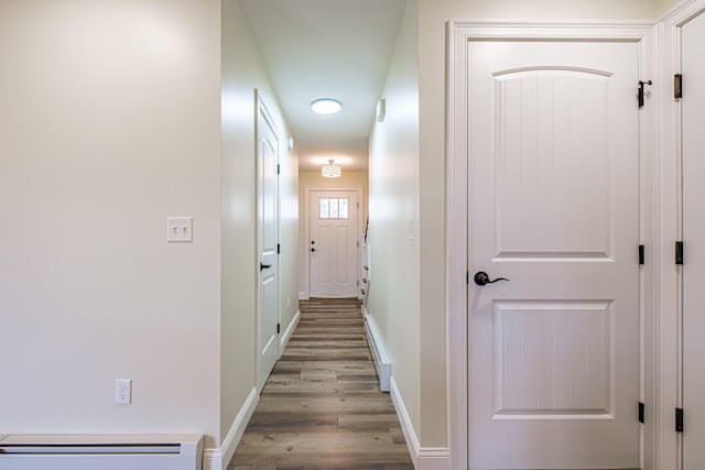 14 Bluebird Trl Unit 67, Falmouth, ME 04105 - corridor with light wood finished floors, a baseboard radiator, and baseboards
