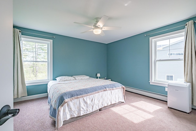 14 Bluebird Trl Unit 67, Falmouth, ME 04105 - bedroom with baseboard heating, carpet flooring, a ceiling fan, and baseboards