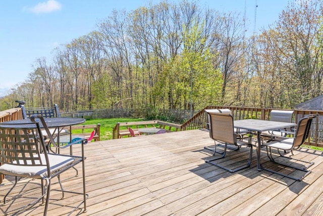 414 Oak Hill Rd, Litchfield, ME 04350 - wooden deck with outdoor dining space