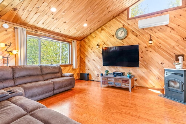 414 Oak Hill Rd, Litchfield, ME 04350 - living area with a wood stove, wooden walls, wood finished floors, wooden ceiling, and recessed lighting