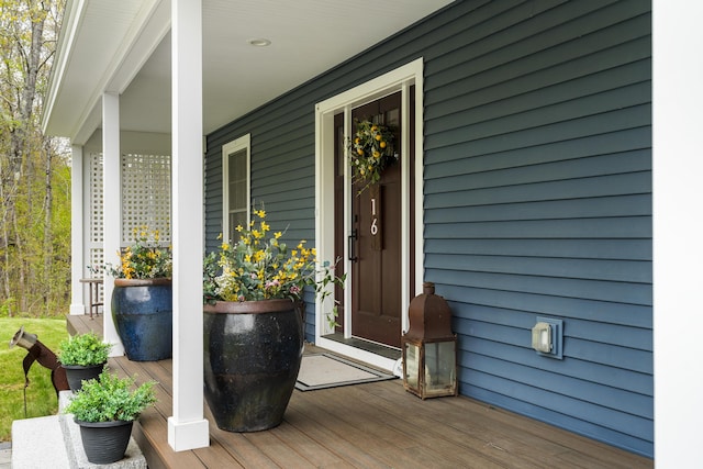 16 Sweet Fern Ln, Bowdoinham, ME 04008 - doorway to property featuring a porch