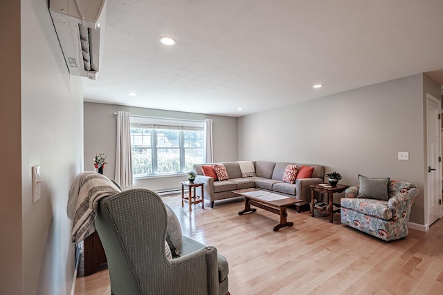 48 Sancho Dr, Saco, ME 04072 - living area featuring light wood-style flooring, recessed lighting, and baseboard heating