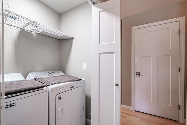 48 Sancho Dr, Saco, ME 04072 - laundry area with washing machine and dryer and light wood finished floors