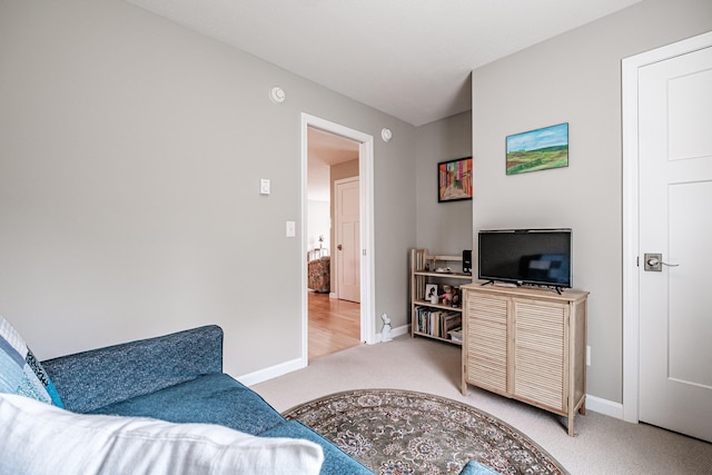 48 Sancho Dr, Saco, ME 04072 - living area with carpet flooring and baseboards