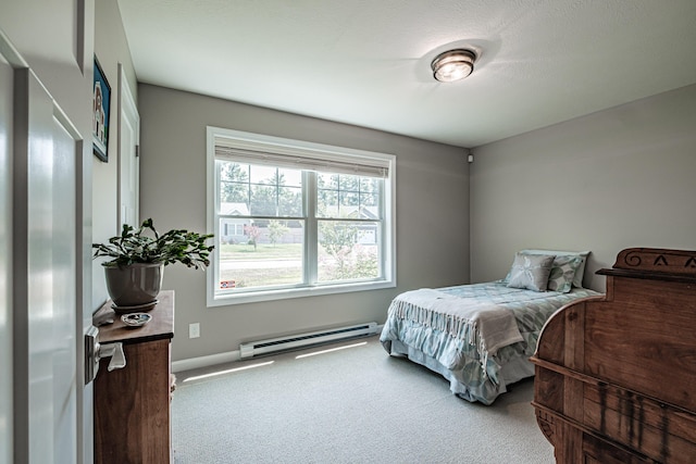 48 Sancho Dr, Saco, ME 04072 - carpeted bedroom featuring baseboard heating and baseboards