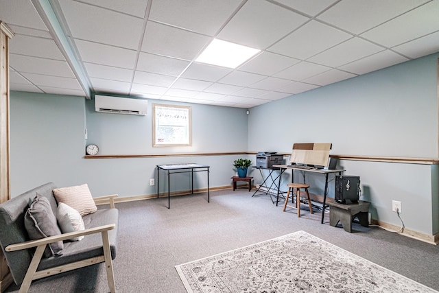 48 Sancho Dr, Saco, ME 04072 - home office with an AC wall unit, carpet, baseboards, and a drop ceiling