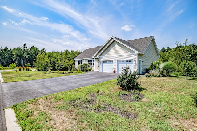 48 Sancho Dr, Saco, ME 04072 - single story home with driveway, an attached garage, and a front lawn