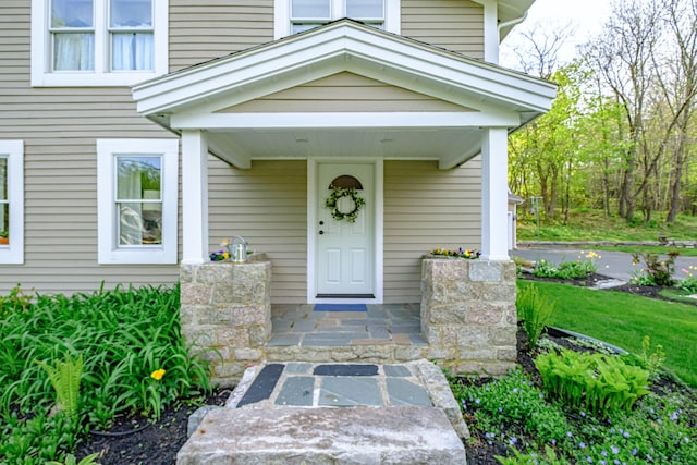 71 Brook Rd, Falmouth, ME 04105 - doorway to property featuring a porch