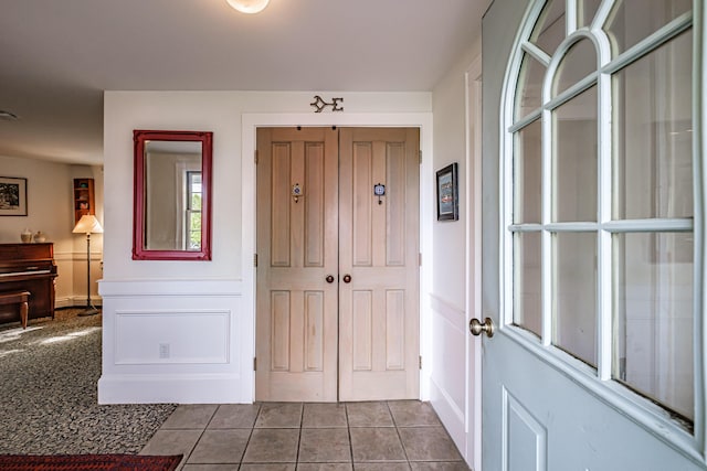 71 Brook Rd, Falmouth, ME 04105 - entrance foyer featuring dark tile patterned floors