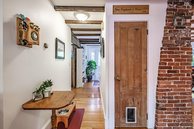 71 Brook Rd, Falmouth, ME 04105 - hall featuring light wood-type flooring and beam ceiling